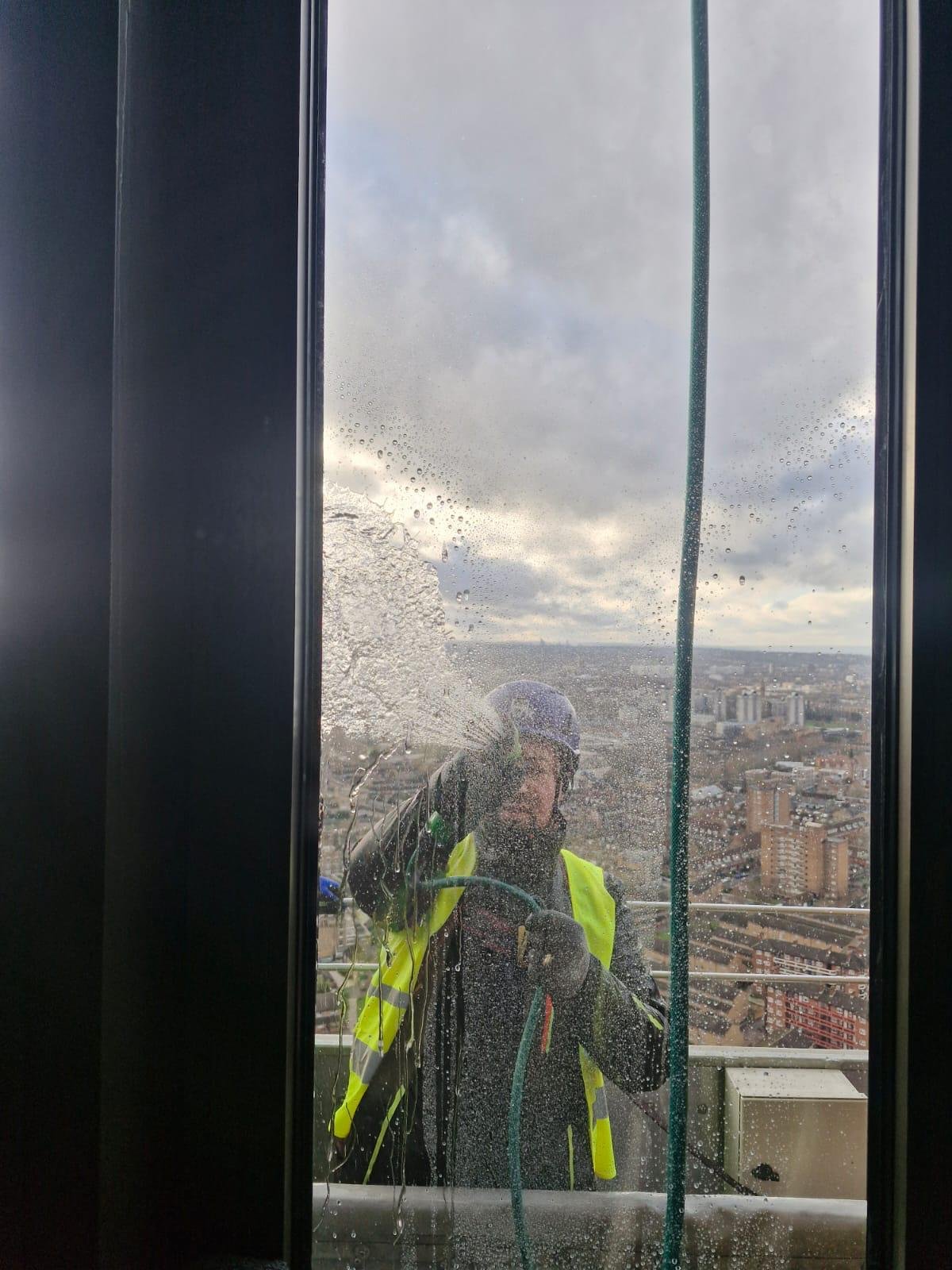 Pure-water cleaning of glazing at height